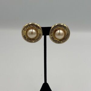 Authentic Chanel Earrings in gold and faux pearl pearl